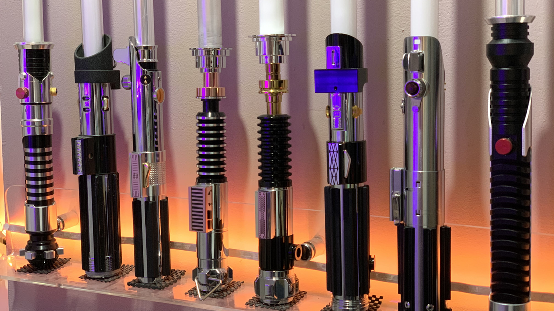 Collection of detailed Star Wars lightsaber replicas